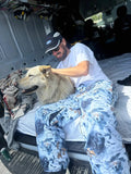 Dog1 view of the CHECKthefeed VX Classic Snowboard Pants - Dog Snow Camo Print CTF-VXCLASSICPANTSDOG Pants,  26/27 Unisex's model
