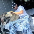 Dog1 view of the CHECKthefeed VX Classic Snowboard Pants - Dog Snow Camo Print CTF-VXCLASSICPANTSDOG Pants,  26/27 Unisex's model
