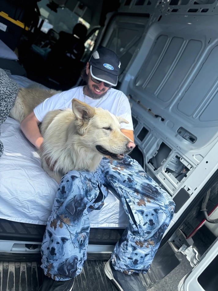 Dog2 view of the CHECKthefeed VX Classic Snowboard Pants - Dog Snow Camo Print CTF-VXCLASSICPANTSDOG Pants,  26/27 Unisex's model