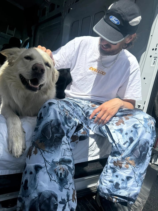 Dog4 view of the CHECKthefeed VX Classic Snowboard Pants - Dog Snow Camo Print CTF-VXCLASSICPANTSDOG Pants,  26/27 Unisex's model