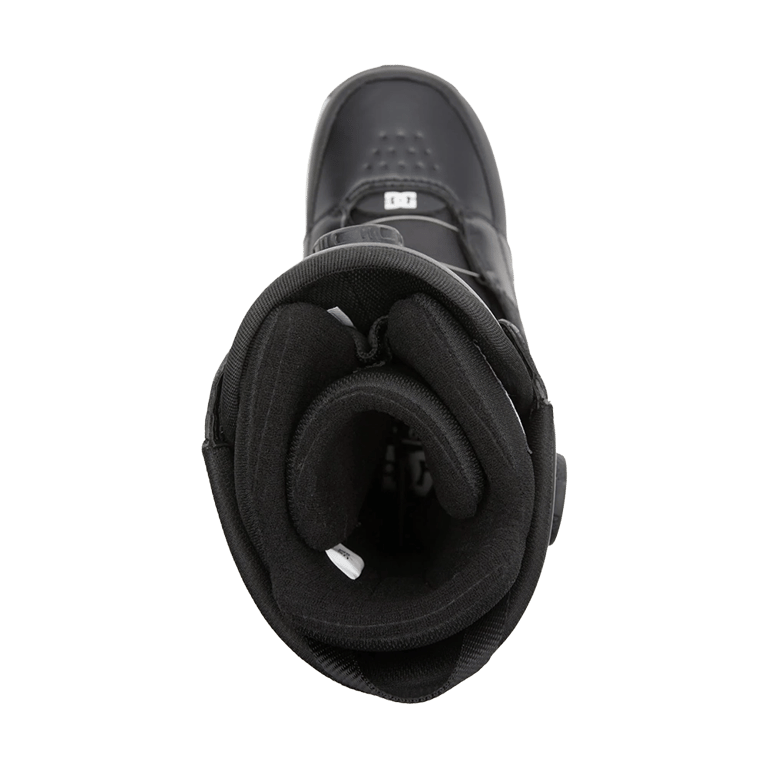 Top-down view of a black DC Control BOA snowboard boot showing the padded interior liner and toe box.