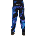 Rear view of Dharco Kids Gravity Pants in a blue and purple abstract pattern with white branding and zippered back pocket.