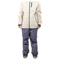 Slate blue Endeavor 3L Shelter Bib Snowboard Pants worn with a cream jacket and black boots, front view.