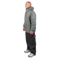 Side profile of a man wearing a moss green Endeavor Aeroshield Insulated Snowboard Jacket and black cargo pants.