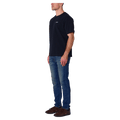 Side view of man in the Rollas Ezy Classic Tee in Colour Washed Black
