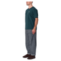 Side view of man in the Rollas Ezy Classic Tee in Colour Washed Pine