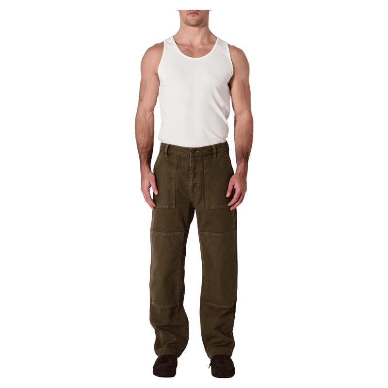 Front view of man in the  Rollas Ezy Electric Jeans in colour Olive