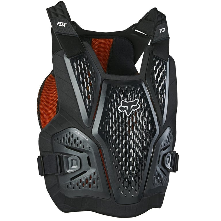 Black and orange Fox Raceframe Impact chest protector with perforated front panel, adjustable straps, and white logo.