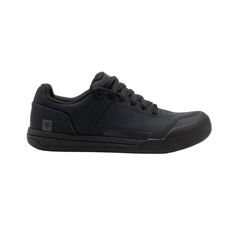 Side profile of black Fox Union Canvas mountain bike shoes with canvas upper, laces, and reinforced toe cap.