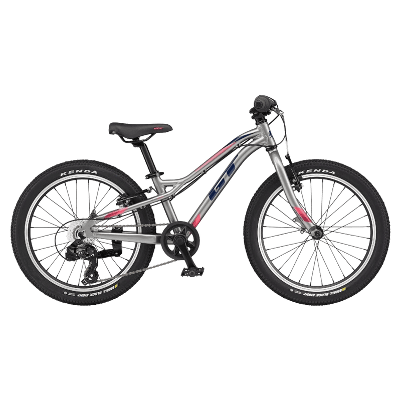 Silver GT Stomper Prime kids mountain bike with pink and blue accents and Kenda tires, side profile view.