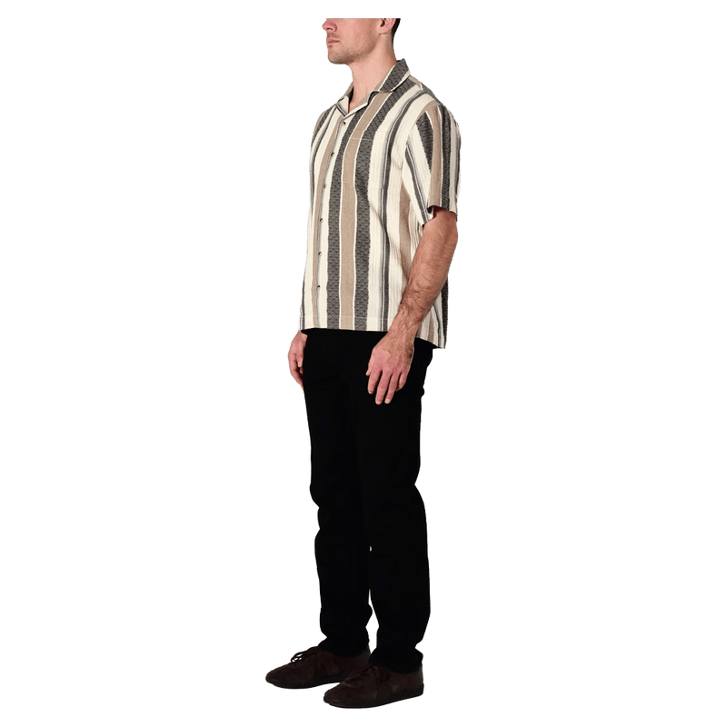 Side view of man in the Rollas Headway Bowler in colour Beige Stripe