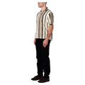 Side view of man in the Rollas Headway Bowler in colour Beige Stripe