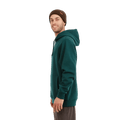 Side view of the XTM Hyams Hoodie in Pine colourway, unisex's model