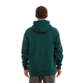 Back view of the XTM Hyams Hoodie in Pine colourway, unisex's model