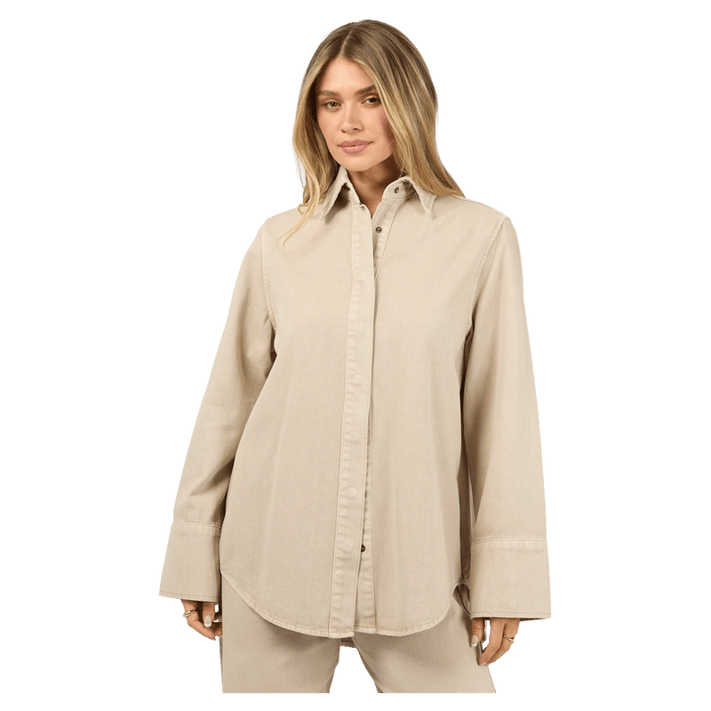 All About Eve Percy Shirt in beige, a long-sleeved button-down top with a collar and curved hem.