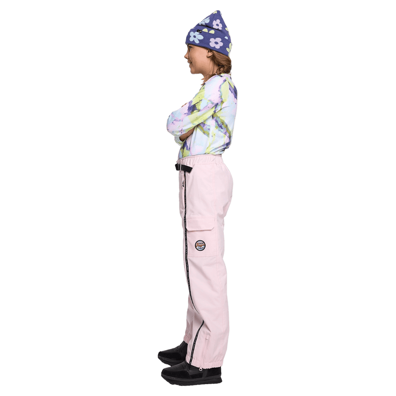 Side view of youth wearing the Rojo She Ripz Ski Pants - Kids in colour Pink-a-boo