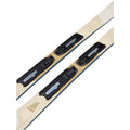 Close-up of cream and gold K2 Blur 76 women's skis with black binding plates and geometric line patterns.