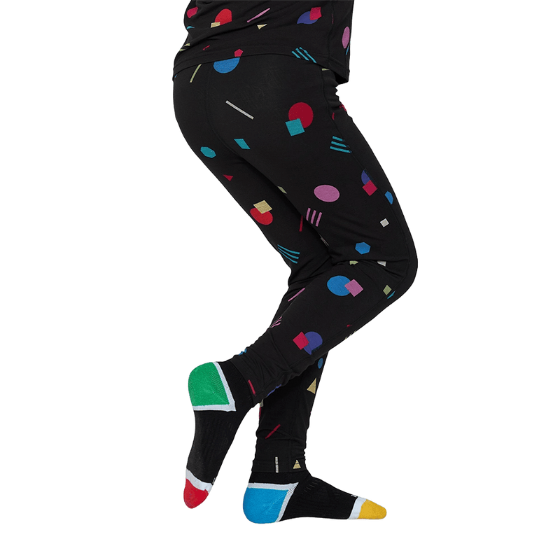 side view of child wearing Le Bent Confetti Midweight Thermal Bottom - Kids
