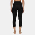 Woman wearing Le Bent Core Lightweight Thermal 3/4 Bottom back view
