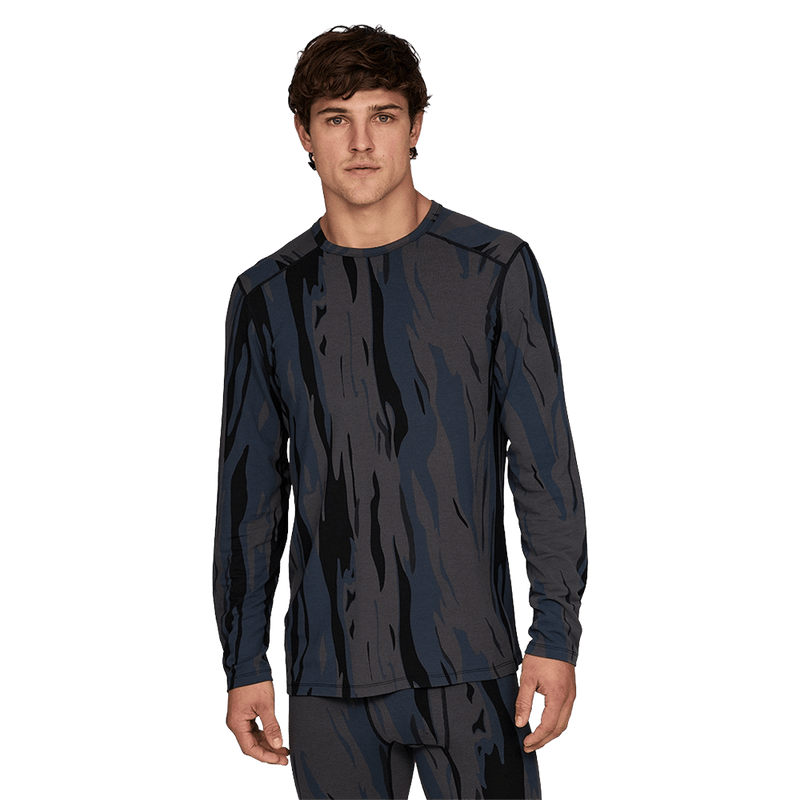 Man wearing Le Bent Midweight Thermal Crew ombre snow gum