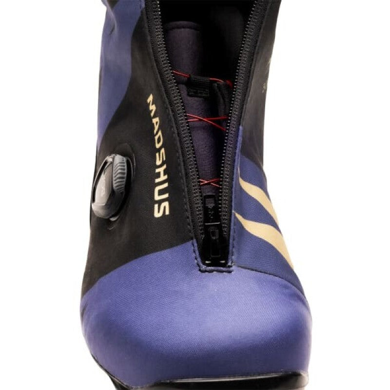 A single Womens Black and purple Madshus Pulse Boa Classic cross country ski boot showing the front zipper opening