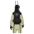 Carried view of the mmmut Nirvana 22L Backpack in Black colourway, unisex model