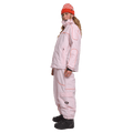 Side view of woman wearing the Rojo Nine Oh Ski Jacket - Womens in Pink-a-boo.