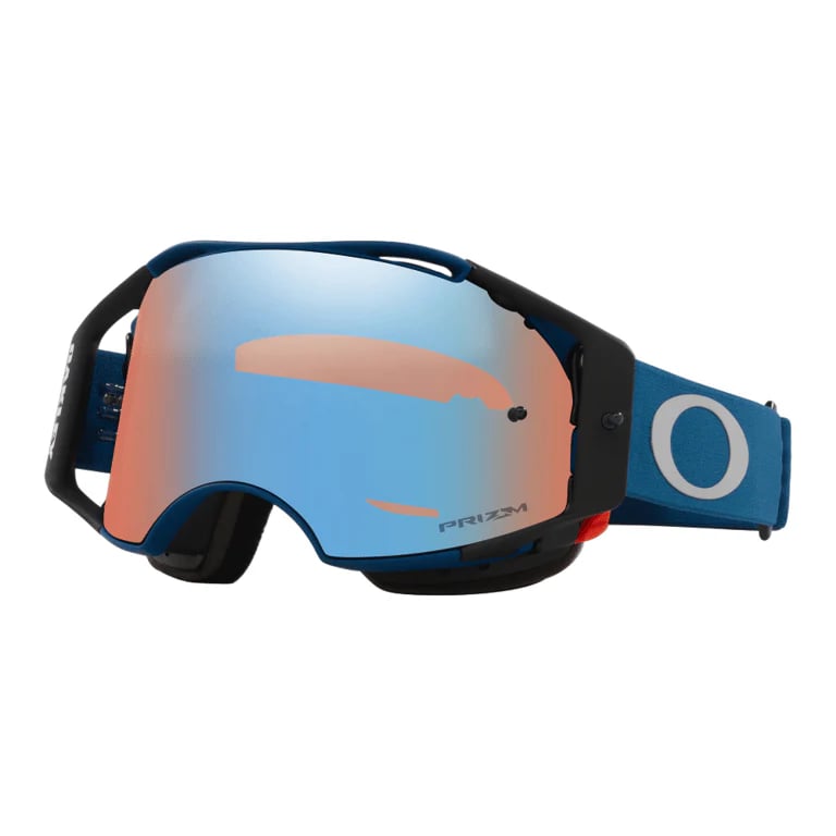 Oakley Airbrake MTB goggles with blue and black frame, mirrored Prizm lens, and blue strap with white logo.