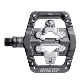 Grey One Up Components clip-in mountain bike pedal with silver metal mechanism and threaded spindle.
