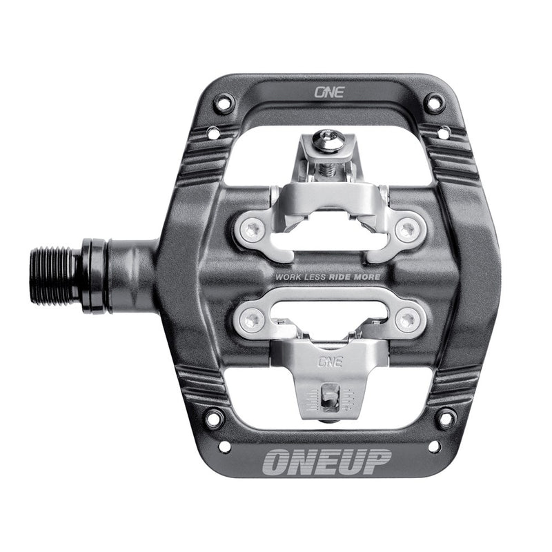 Grey One Up Components clip-in mountain bike pedal with silver metal mechanism and threaded spindle.
