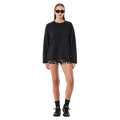 FAR view of the PE NATION Oversized LS Washed Black Tee,  26/27 Womens's model