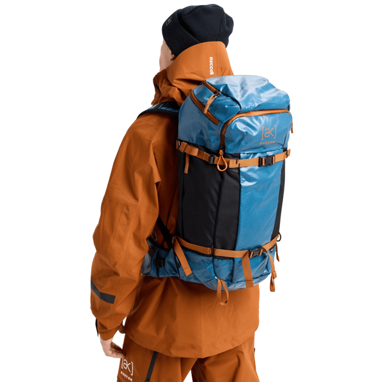 In action view of the Burton AK Dispatcher Backcountry Backpack in Blue Teal colourway, unisex's model