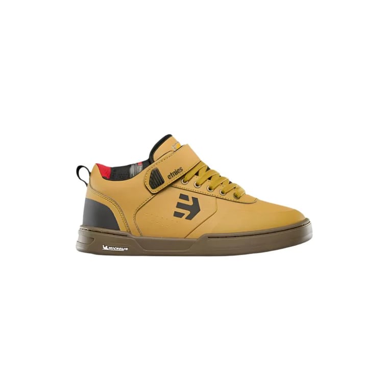 Tan Etnies Camber Mid Michelin bike shoe with black logo, ankle strap, and brown rubber sole, side view.