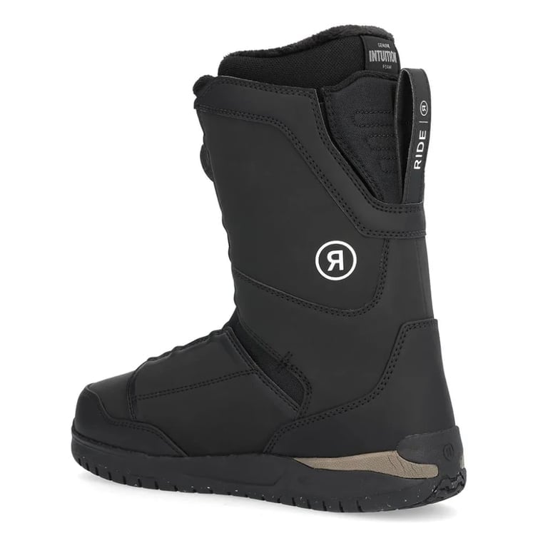 Black Ride Deadbolt snowboard boot from a side-rear view with white logo, BOA dial, and Intuition foam liner.