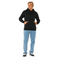 Black Rip Curl Classic Surf Hoodie with kangaroo pocket and drawstrings worn by a man in light blue jeans.