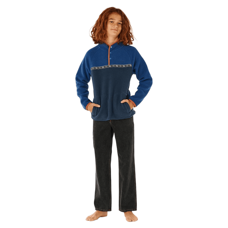 Kids' Rip Curl Heritage Polar Fleece in blue and navy with a patterned chest stripe, orange trim, and snap buttons.