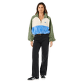 Rip Curl Hotel Malibu half-zip polar fleece jumper with green, cream, and blue color-block panels on a woman.