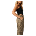 Side view of women's Rip Curl Paradise Camo Cargo Pants in olive green with a floral hibiscus print and side pocket.