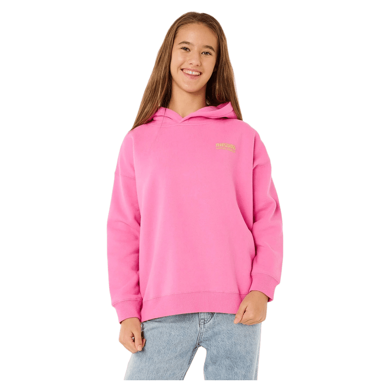 Rip Curl Surf Puff Heritage Hoodie for kids in bright pink with yellow chest logo, worn by a girl.