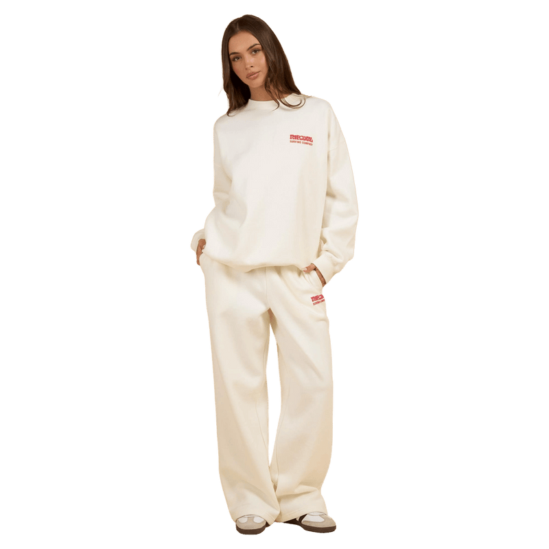 Off-white Rip Curl Surf Puff Inspired Crew sweatshirt with a small red chest logo and matching wide-leg sweatpants.