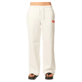 White Rip Curl wide-leg trackpants with a drawstring waist and a small red logo on the hip.