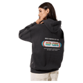 Back view of a woman wearing a charcoal grey Rip Curl Surf Revival Heritage Hoodie with a rainbow logo and retro graphics.