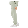 Sage green Rip Curl Varsity Sports Track Pant for women with elastic cuffs and side pockets, side profile view.
