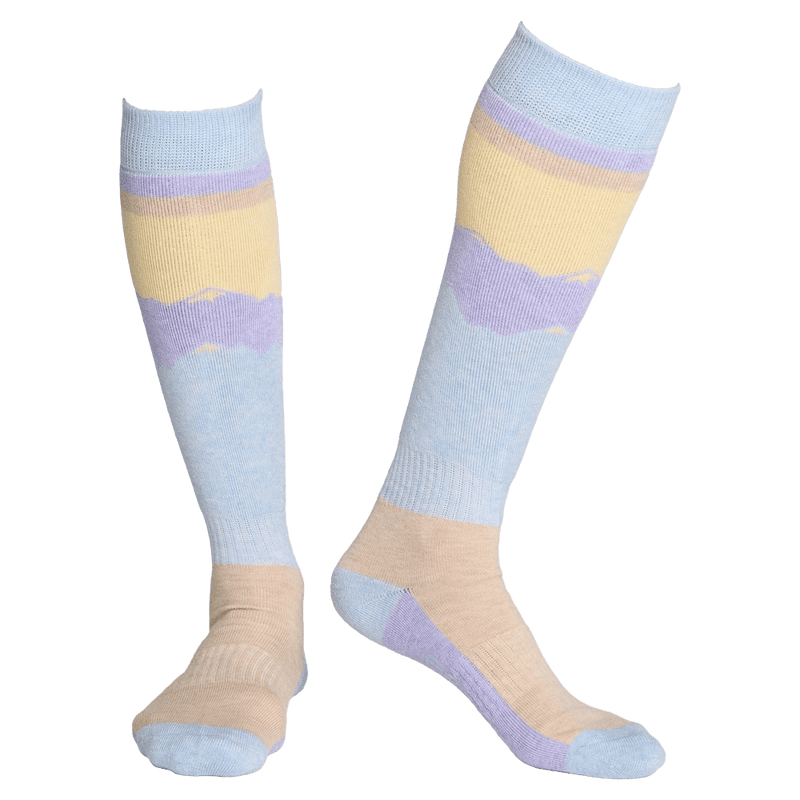 Rojo All Mountain women's socks in light blue, lavender, and yellow with a mountain silhouette pattern.