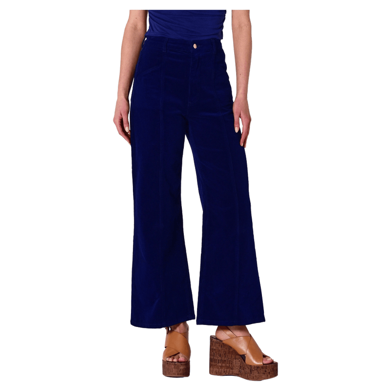 Front view of a women in the Sailor Deco Marine Cord Jeans in colour Marine