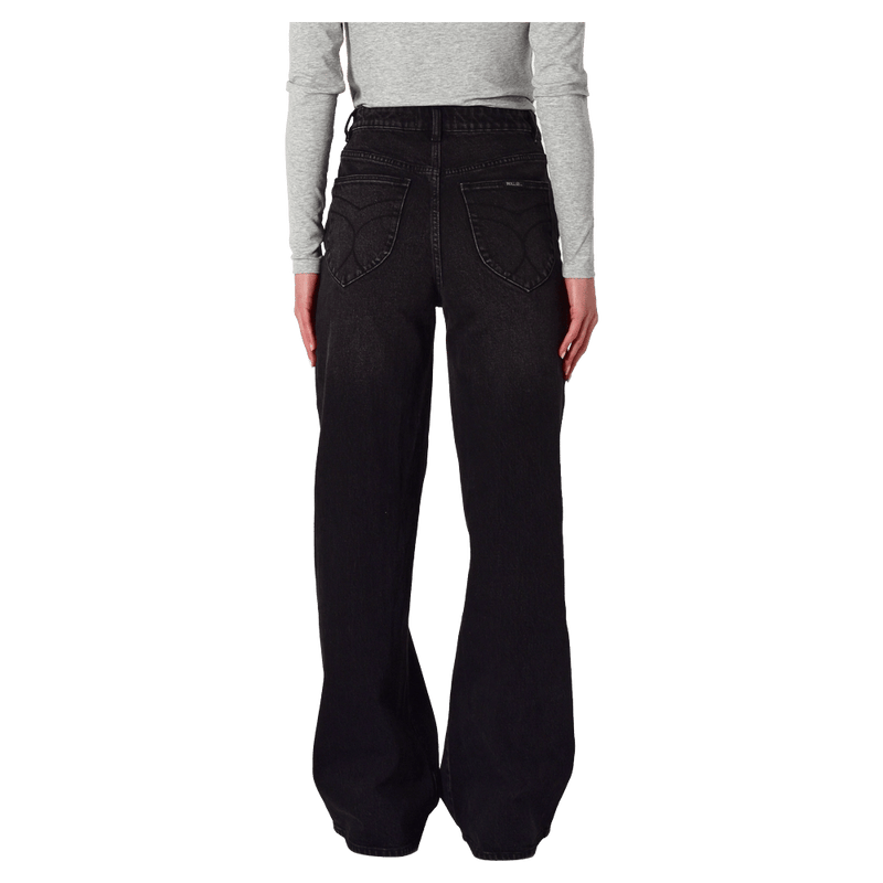 Back view of a women in  Sailor Scoop Long Jeans in colour Black Rock