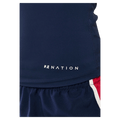 Logo view of the PE NATION Foundation Muscle Tank Dark Navy Tops,  26/27 Womens's model