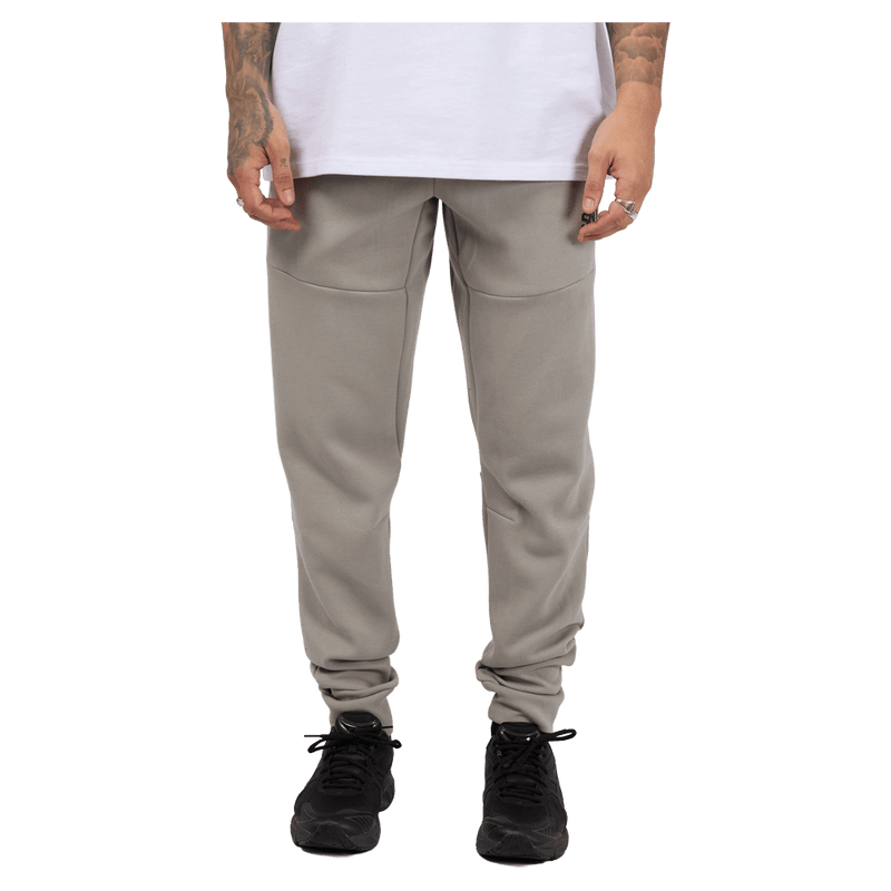 Front view of the St. Goliath Tech Track Pants in Grey colourway, men's model