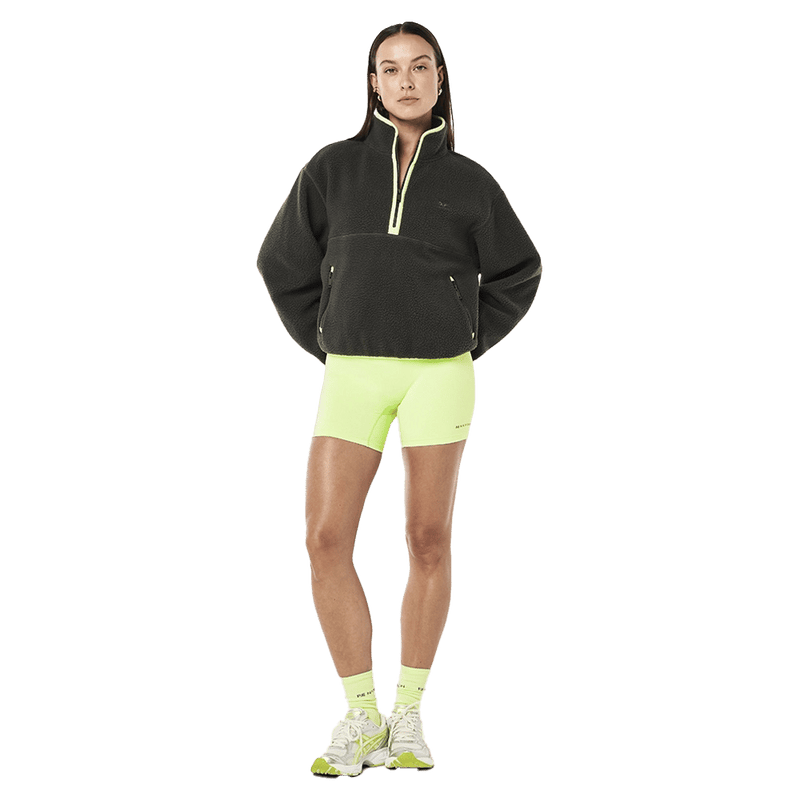 Fulll view of the PE NATION Verde Sherpa Quarter Zip Cavier/Washed Lime Jumper,  26/27 Womens's model
