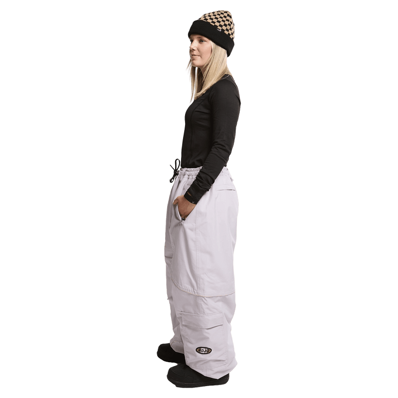 Side view of women wearing the Rojo Nine Oh Ski Pants - Womens in Thistle.
